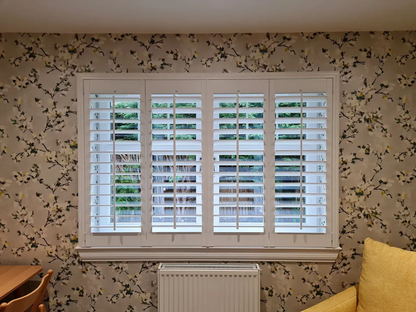 Living room plantation shutters